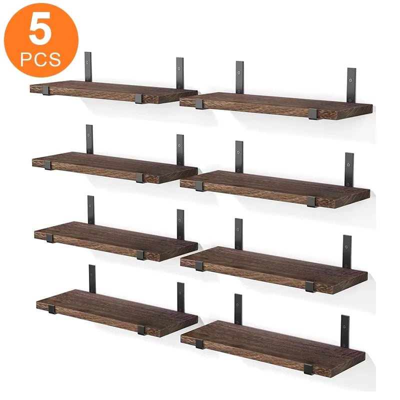 Set of 5 rustic dark walnut wood floating wall shelves with matte black metal brackets mounted on a white wall