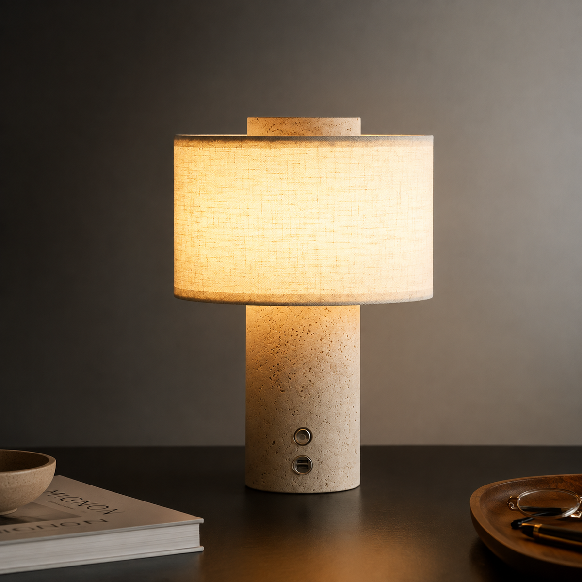 Nordic Travertine Table Lamp glowing on a dark desk with warm ambient light