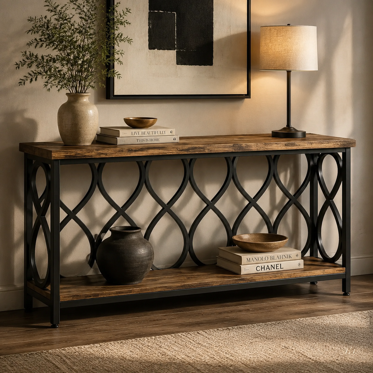 Ogee Arch Console Table styled in a modern luxury entryway with vase, lamp and art