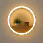 Circular LED Wall Light with Floating Shelf in White — warm glow close-up