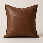Woven leather throw pillow cover in cognac brown on white background